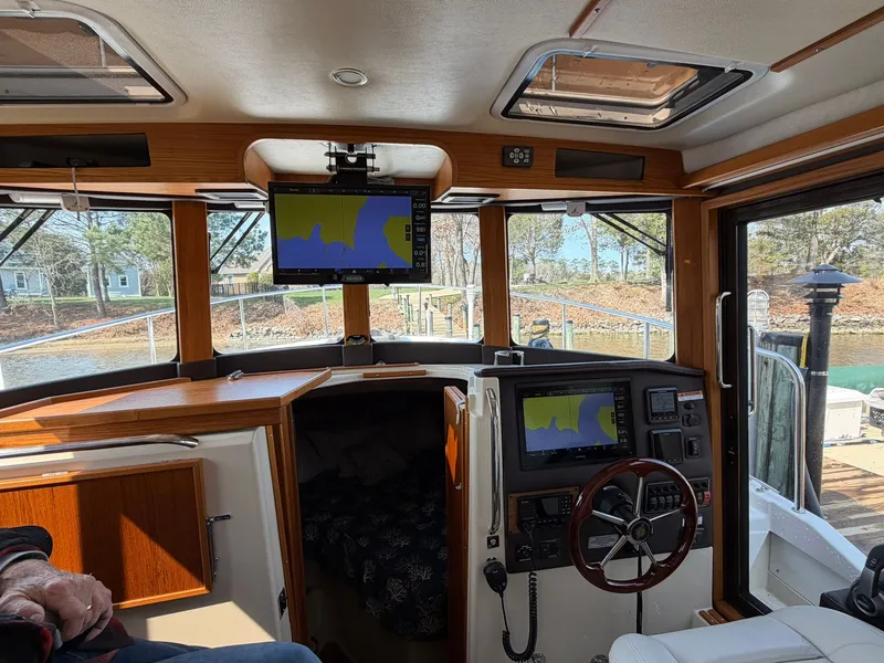 Slide: The Image of Interior of 2022 Ranger Tugs R-31 CB with navigation system. - 31