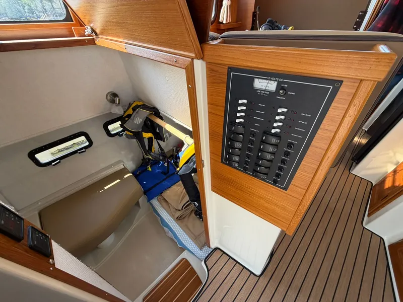 Slide: The Image of Interior of 2022 Ranger Tugs R-31 CB with control panel. - 39