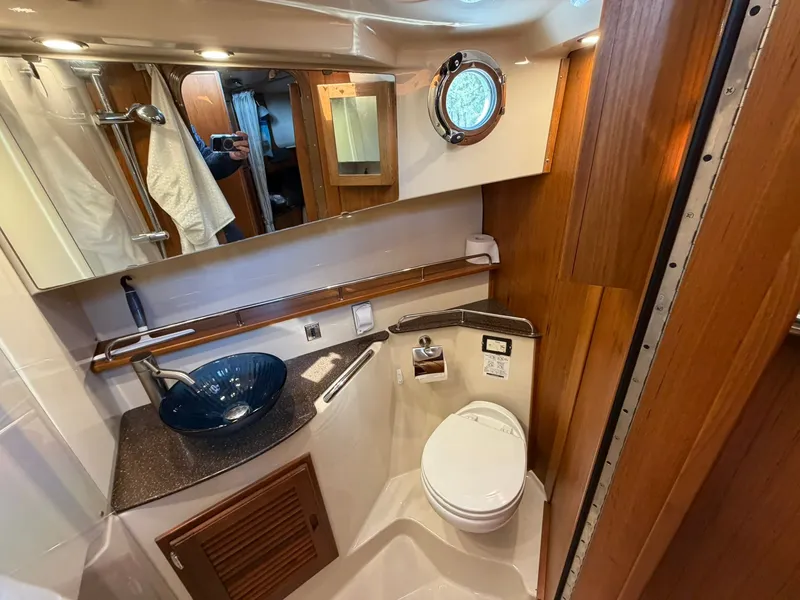 Slide: The Image of Luxurious bathroom in Ranger Tugs R-31 CB yacht, 2022 model. - 44