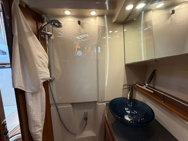 Slide: The Image of Interior view of 2022 Ranger Tugs R-31 CB bathroom. - 45