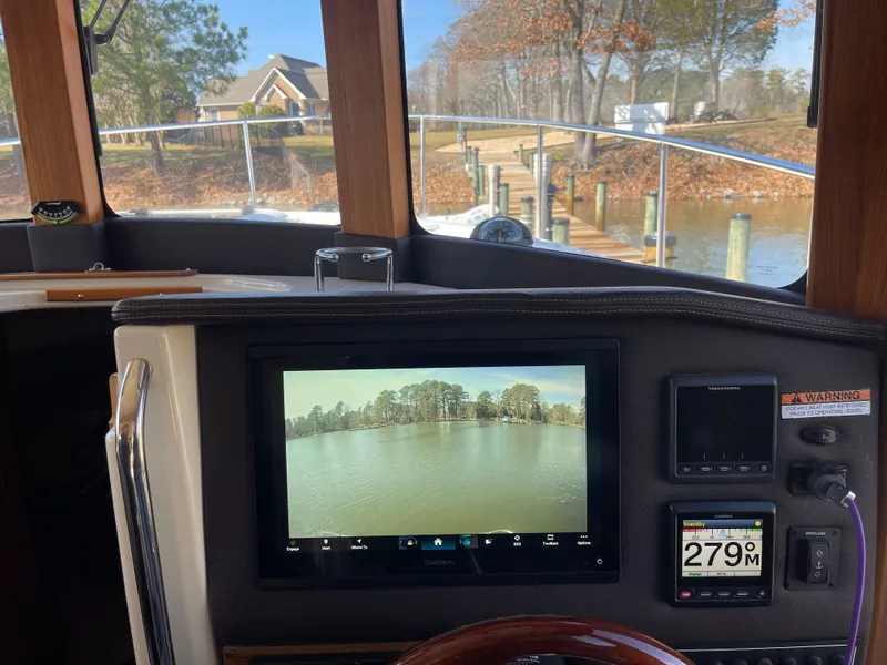 Slide: The Image of Interior view of 2022 Ranger Tugs R-31 CB with navigation system. - 9