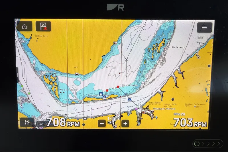 Slide: The Image of Navigation display on 2005 Silverton 43 Motor Yacht showing coastal map and RPM readings. - 32
