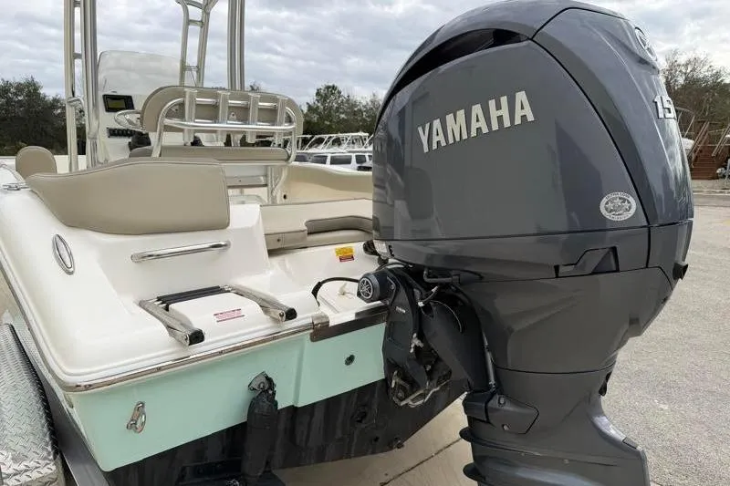 Slide: The Image of 2024 Key West 203 FS boat with Yamaha 150 engine, rear view. - 11