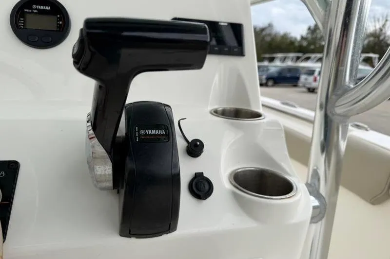 Slide: The Image of 2024 Key West 203 FS boat console with Yamaha throttle and cup holders. - 30