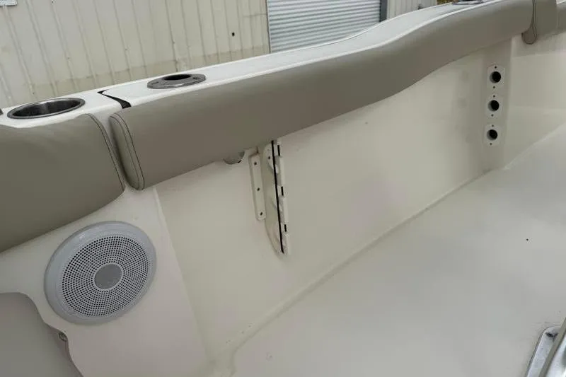 Slide: The Image of 2024 Key West 203 FS boat interior with speaker and cup holders. - 39