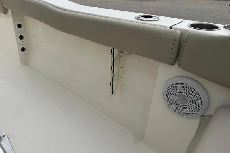 Slide: The Image of 2024 Key West 203 FS boat interior with cup holders and speaker. - 40