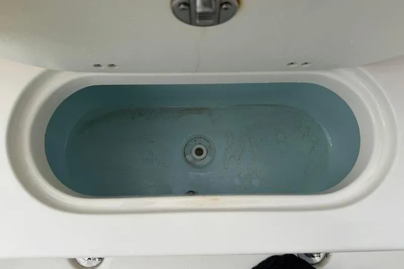 Slide: The Image of Livewell in 2024 Key West 203 FS boat, featuring a clean, oval design. - 41