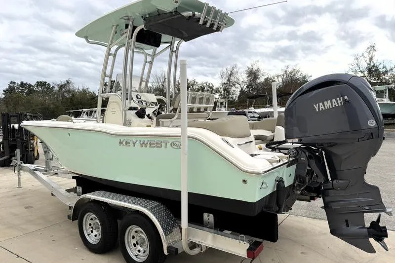 Slide: The Image of 2024 Key West 203 FS boat on trailer with Yamaha outboard motor. - 5