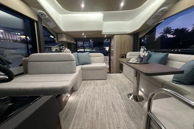 Slide: The Image of Luxurious interior of 2026 Cruisers Yachts 50 Fly with modern seating and elegant decor. - 35