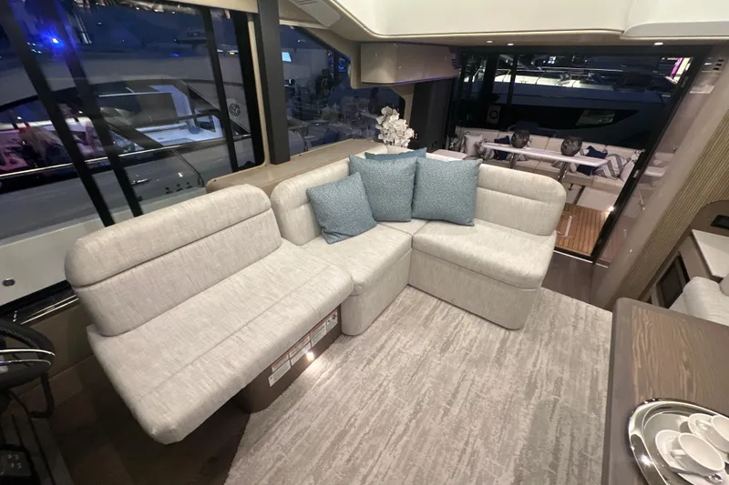 Slide: The Image of Luxurious interior of 2026 Cruisers Yachts 50 Fly with elegant seating and decor. - 36