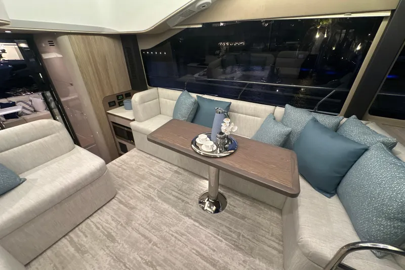 Slide: The Image of Luxurious interior of 2026 Cruisers Yachts 50 Fly with elegant seating and modern decor. - 37