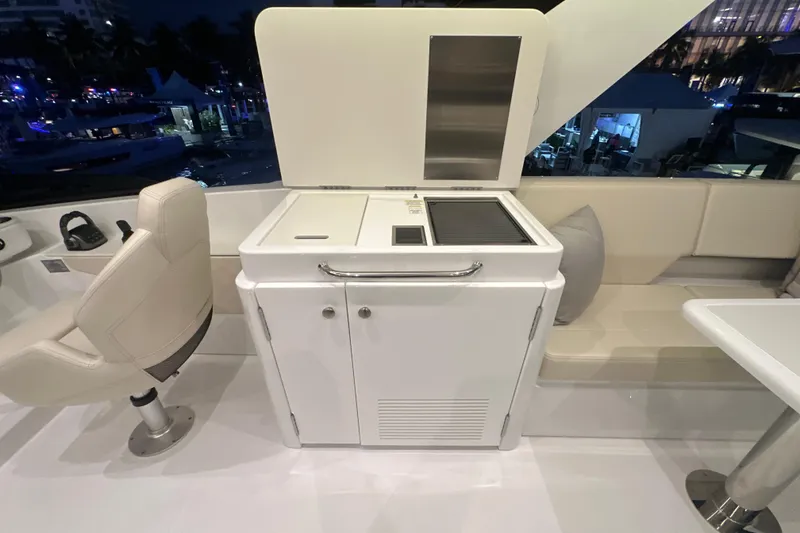 Slide: The Image of Luxurious 2026 Cruisers Yachts 50 Fly interior with sleek seating and modern amenities. - 47