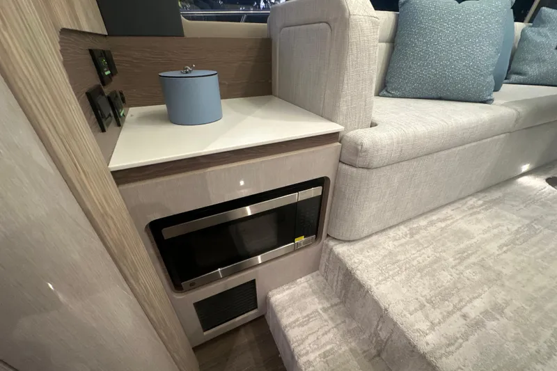 Slide: The Image of Luxurious interior of 2026 Cruisers Yachts 50 Fly with modern amenities and elegant design. - 9