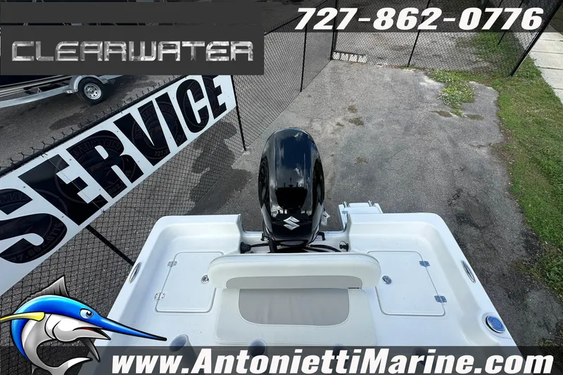 Slide: The Image of 2026 Clearwater 2100 Bay boat with outboard motor at Antonietti Marine service. - 14