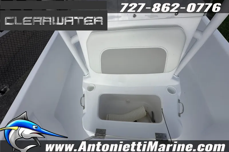 Slide: The Image of 2026 Clearwater 2100 Bay boat interior with storage compartment, contact Antonietti Marine. - 20