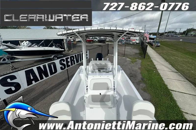 Slide: The Image of 2026 Clearwater 2100 Bay boat displayed at Antonietti Marine dealership. - 21