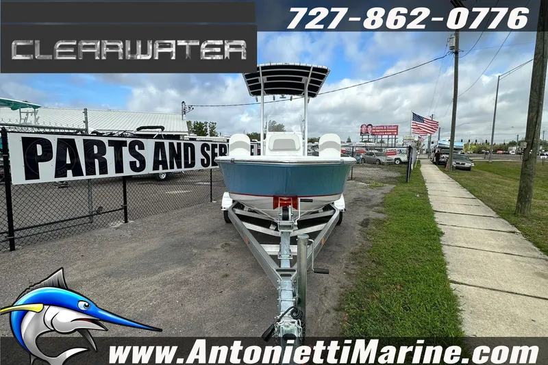 Slide: The Image of 2026 Clearwater 2100 Bay boat on trailer at Antonietti Marine dealership. - 10