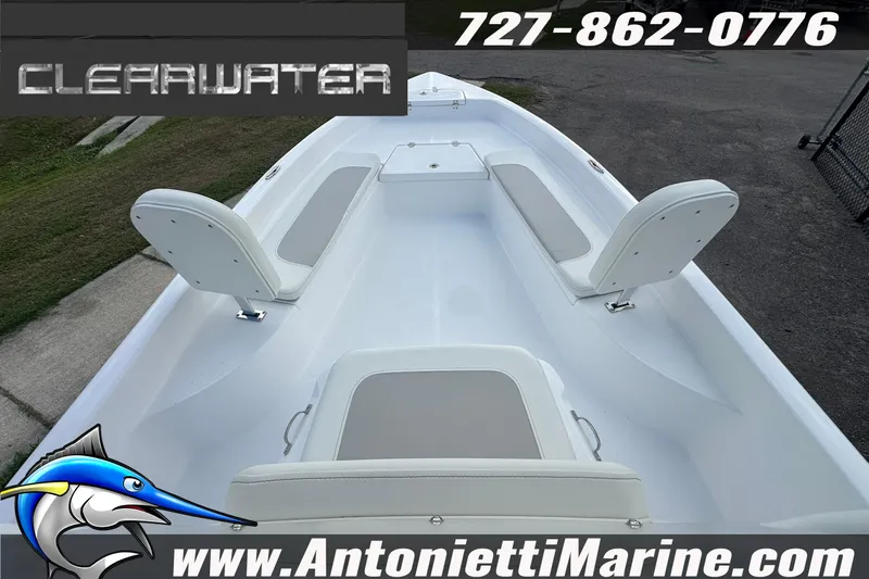 Slide: The Image of Clearwater 2100 Bay boat interior, 2026 model, featuring seating and contact information for Antonietti Marine. - 11