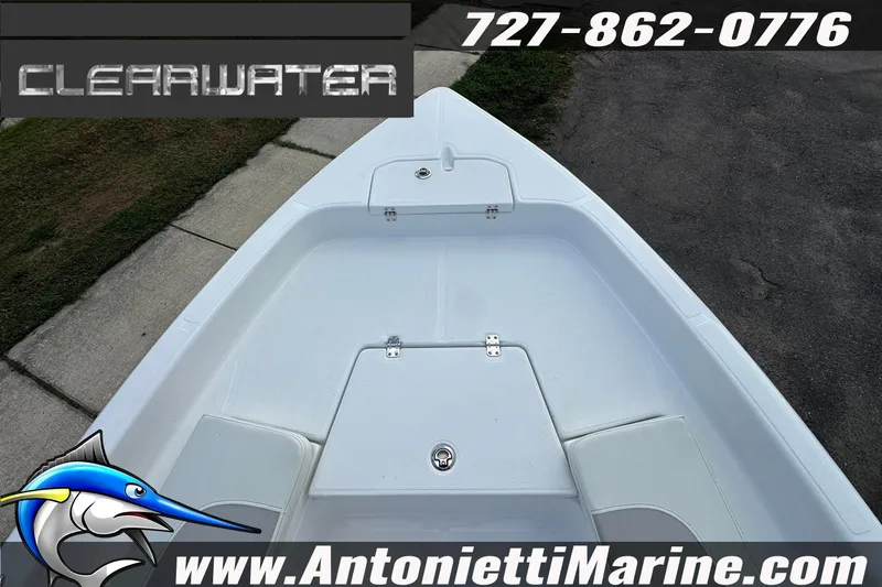 Slide: The Image of Clearwater 2100 Bay boat deck, 2026 model, with contact details and website. - 16