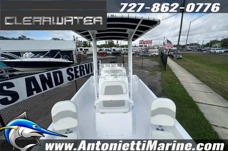 Slide: The Image of 2026 Clearwater 2100 Bay boat displayed at Antonietti Marine dealership. - 17