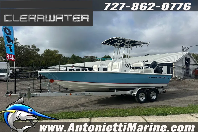 Slide: The Image of 2026 Clearwater 2100 Bay boat on trailer at Antonietti Marine dealership. - 23