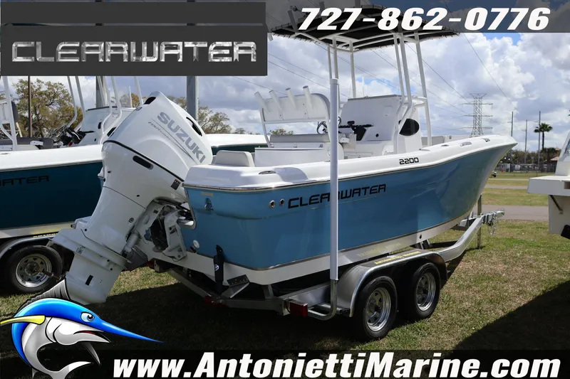 The Image of 2026 Clearwater 2200 Center Console boat with Suzuki engine on trailer. - 1