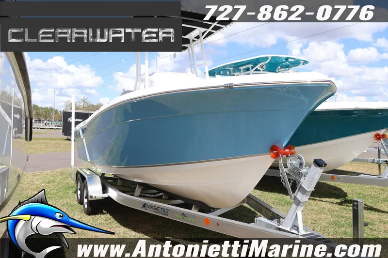 Slide: The Image of 2026 Clearwater 2200 Center Console boat on trailer at Antonietti Marine dealership. - 4