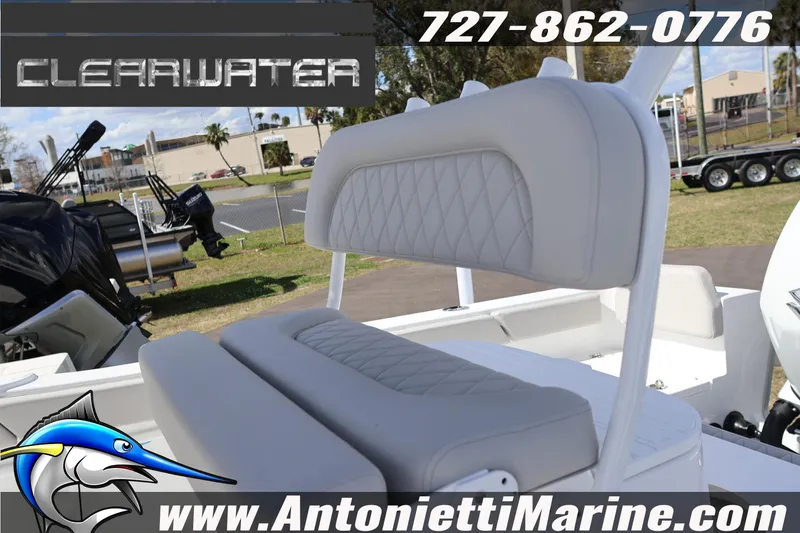 Slide: The Image of 2026 Clearwater 2200 Center Console boat with cushioned seating, displayed at Antonietti Marine. - 6