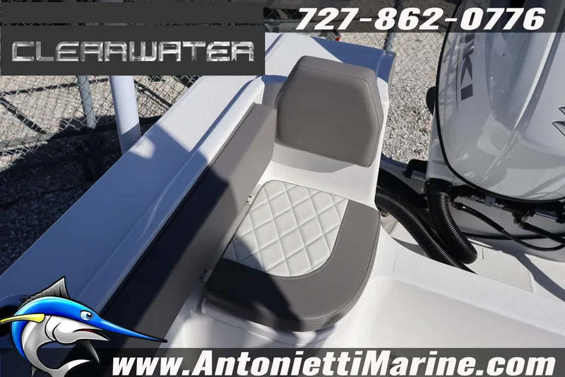 Slide: The Image of 2026 Clearwater 2300 boat seat detail with logo and contact information. - 31