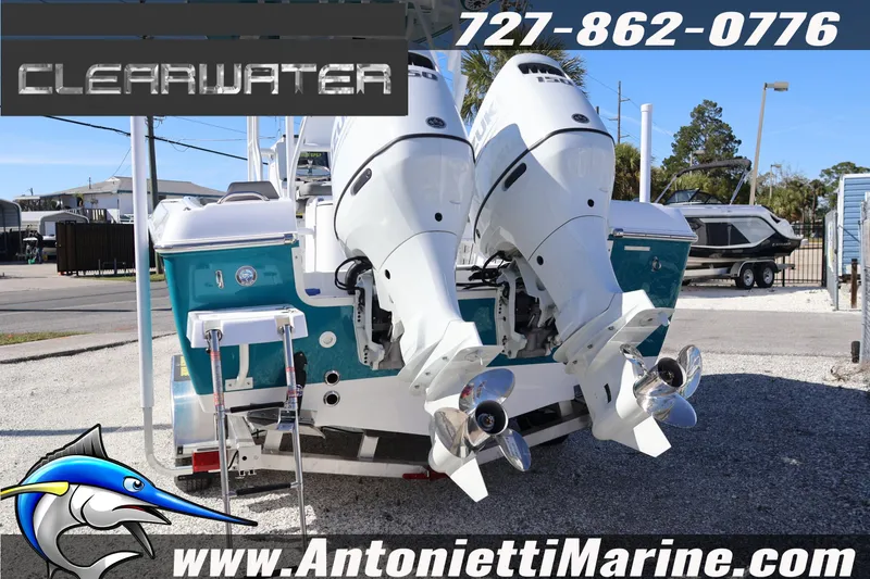 Slide: The Image of Clearwater 2300 boat with dual engines, displayed at Antonietti Marine dealership, 2026 model. - 15