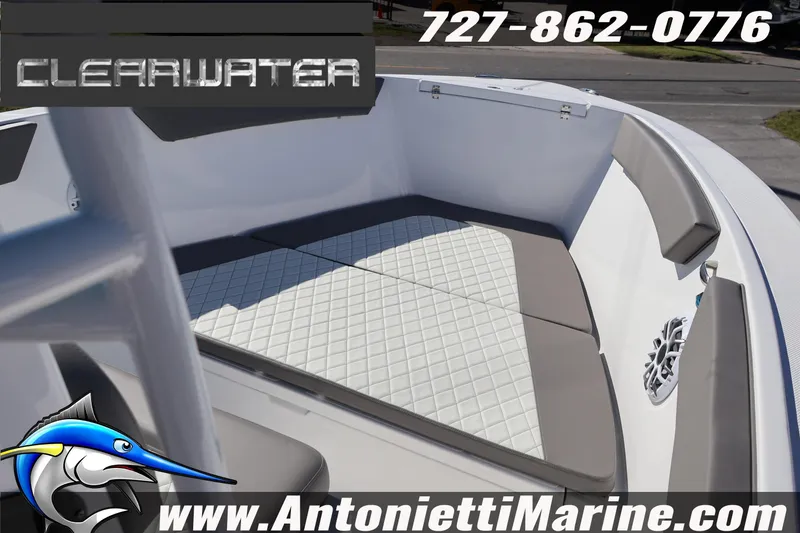 Slide: The Image of 2026 Clearwater 2300 boat interior with cushioned seating, showcased by Antonietti Marine. - 22