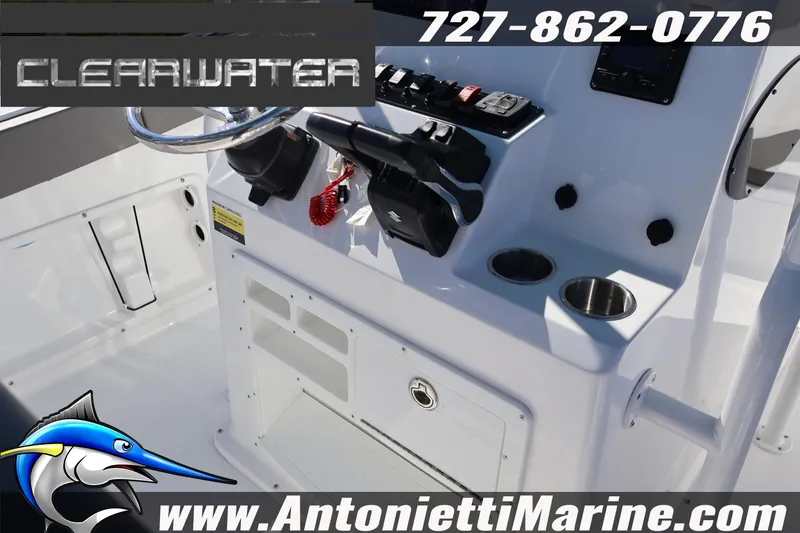 Slide: The Image of Clearwater 2300 boat console with controls and cup holders, 2026 model. - 28
