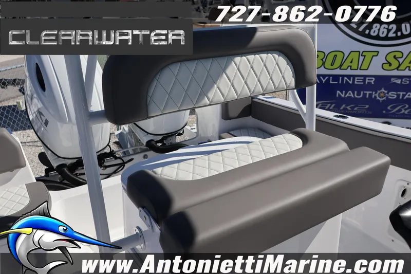 Slide: The Image of 2026 Clearwater 2300 boat seating with diamond stitching, Antonietti Marine branding, contact number visible. - 30