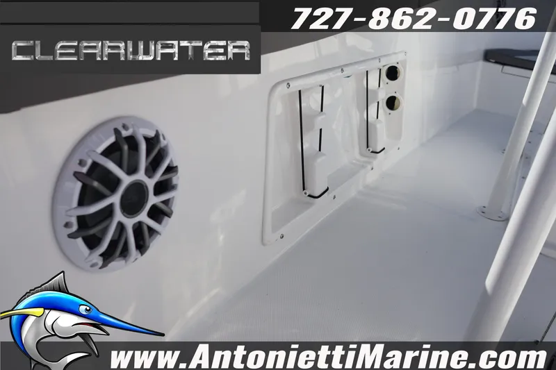 Slide: The Image of 2026 Clearwater 2300 boat interior with speaker and storage compartments. - 33
