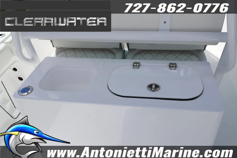 Slide: The Image of 2026 Clearwater 2800 CC boat interior with sink and storage, Antonietti Marine contact details. - 13