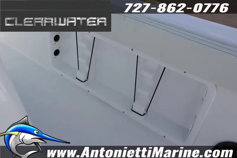 Slide: The Image of 2026 Clearwater 2800 CC boat interior with storage compartment, Antonietti Marine branding. - 15