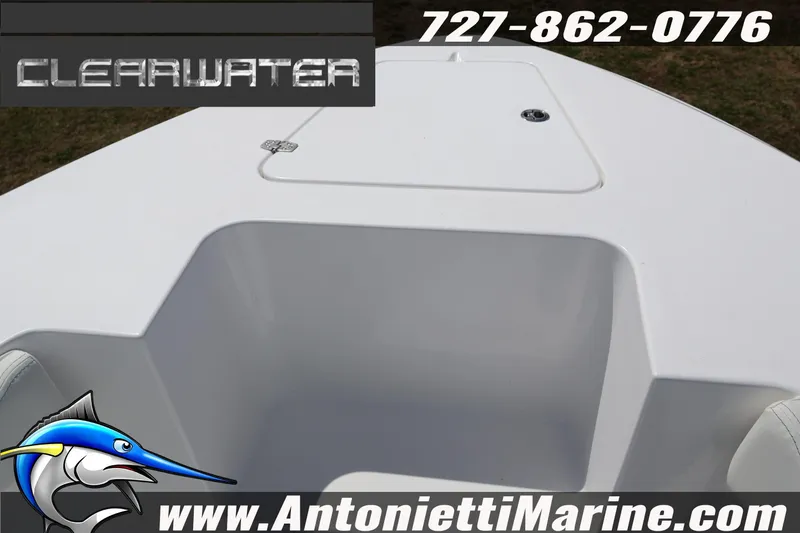 Slide: The Image of 2026 Clearwater 2800 CC boat deck, featuring storage compartment and contact details. - 20