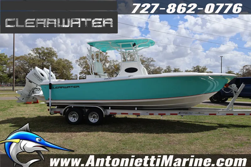 Slide: The Image of 2026 Clearwater 2800 CC boat on trailer at Antonietti Marine dealership. - 5