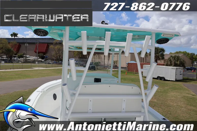 Slide: The Image of 2026 Clearwater 2800 CC boat displayed at Antonietti Marine dealership. - 8