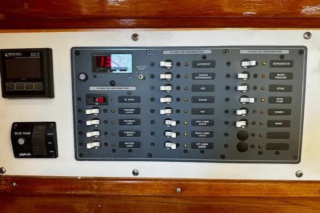 Slide: The Image of Electrical control panel on a 1986 Hunter Passage 450 sailboat. - 26