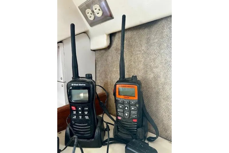 Slide: The Image of Two marine radios on a 1986 Hunter Passage 450 sailboat. - 46