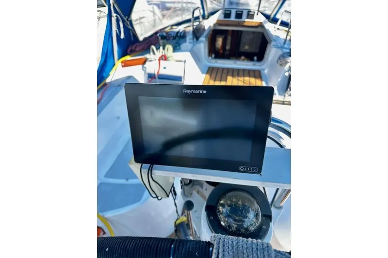 Slide: The Image of Cockpit of 1986 Hunter Passage 450 sailboat with Raymarine navigation display. - 7
