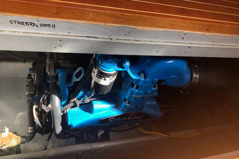 Slide: The Image of Engine compartment of 2003 Silverton 35 Motor Yacht with Crusader engine visible. - 17