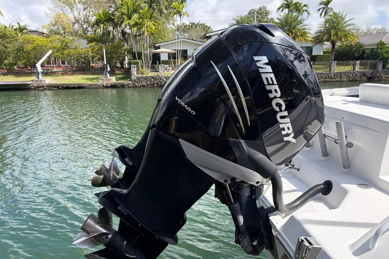 Slide: The Image of 2008 Donzi 29 ZF Cuddy with Mercury outboard engine on a calm waterway. - 15