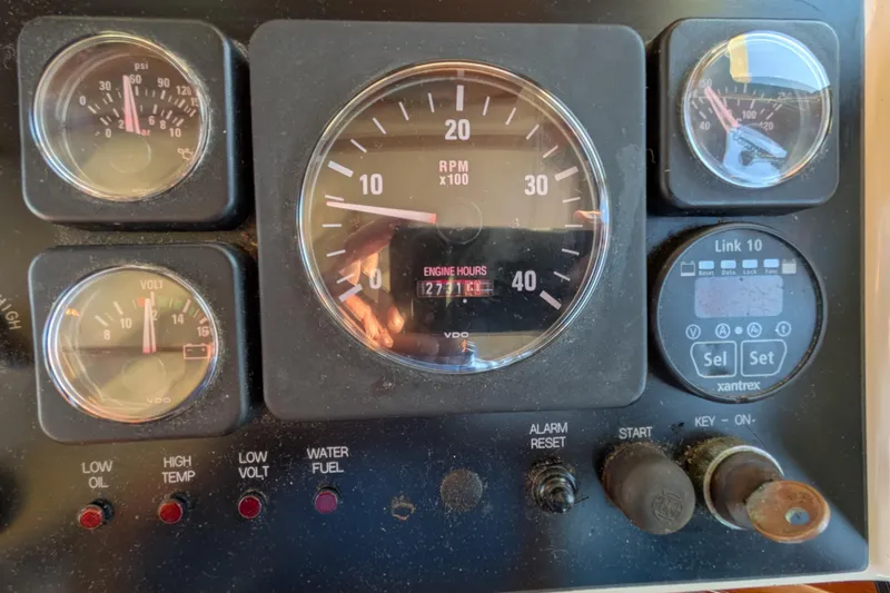 Slide: The Image of Control panel of a 2002 Nordic Tug 32 with gauges and indicators. - 51