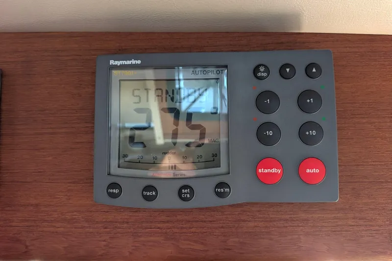 Slide: The Image of Raymarine autopilot control panel on 2002 Nordic Tug 32 boat, displaying heading 275. - 67