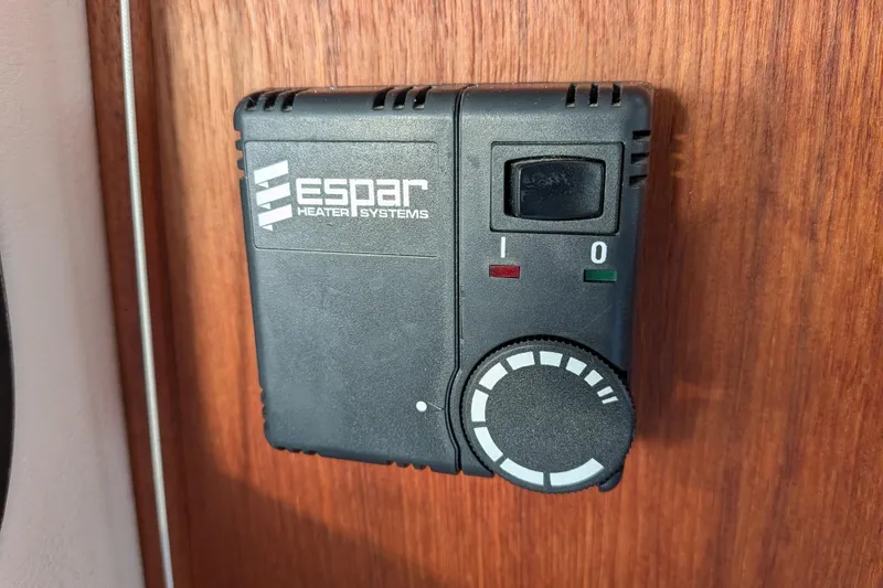 Slide: The Image of Espar Heater Systems control panel on 2002 Nordic Tug 32 boat interior. - 74