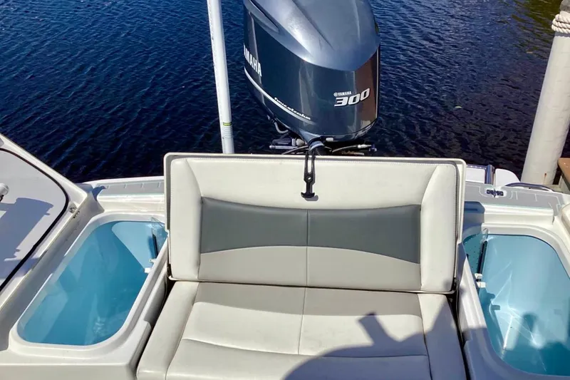 Slide: The Image of 2019 Crevalle 26 Bay boat with Yamaha 300 engine, featuring comfortable seating and storage compartments. - 7