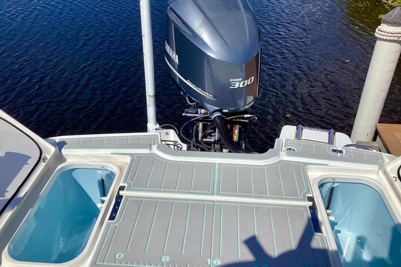 Slide: The Image of 2019 Crevalle 26 Bay boat with Yamaha 300 engine on water. - 8
