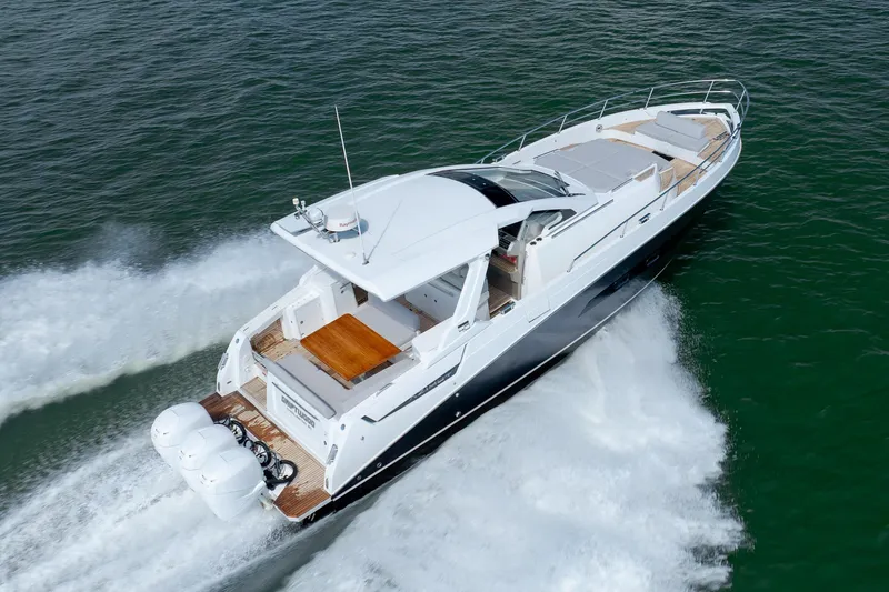 Slide: The Image of 2019 Azimut Verve 40 yacht cruising on open water, aerial view. - 11